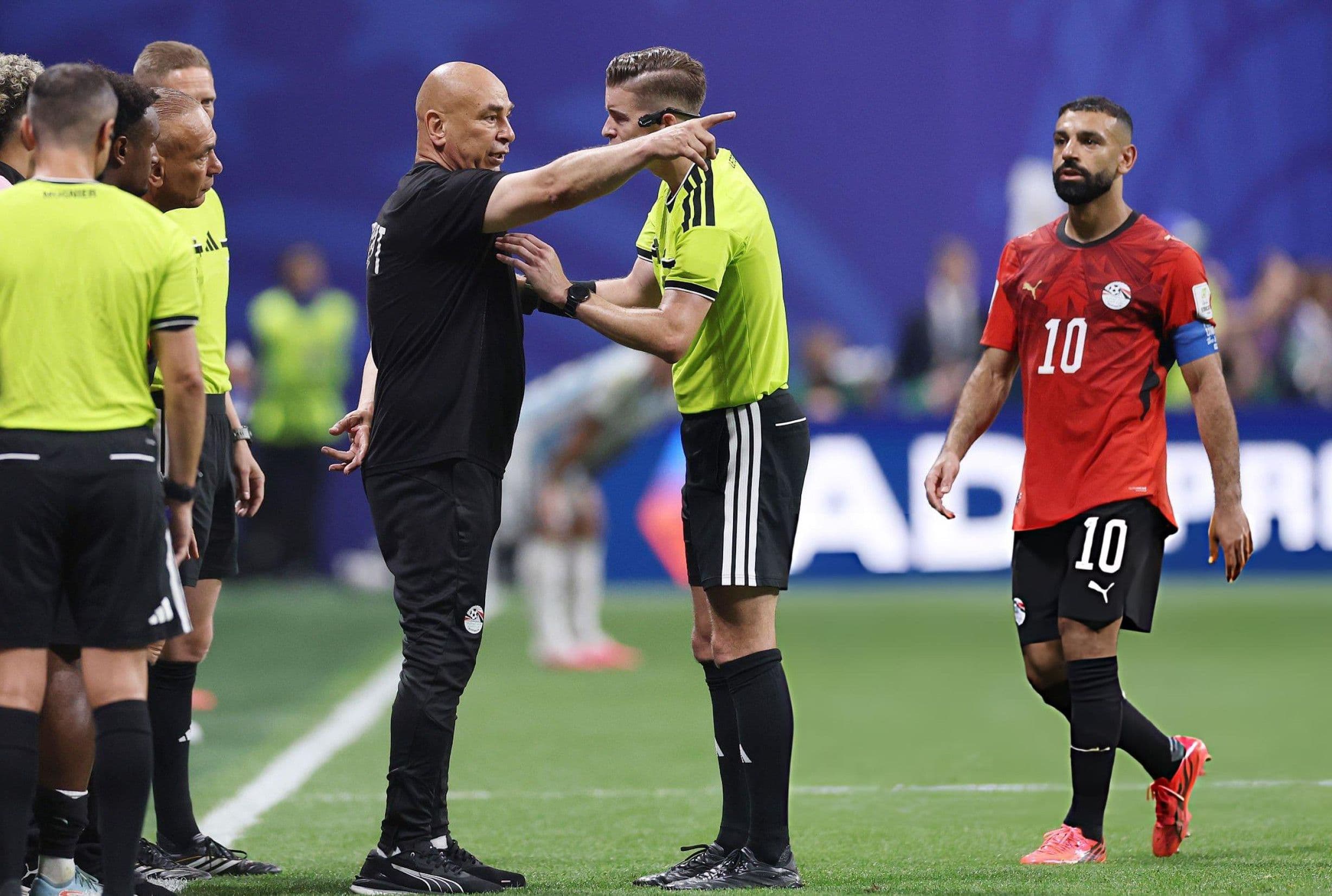 Ref arguing with Egypt's coach